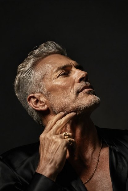 Close-up portrait of silver-haired executive